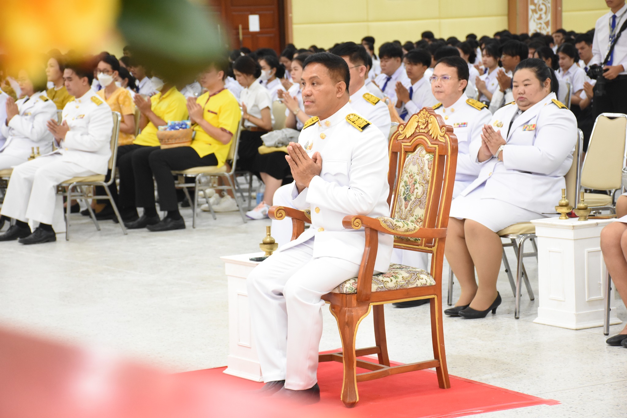 Making merit by giving alms to monks